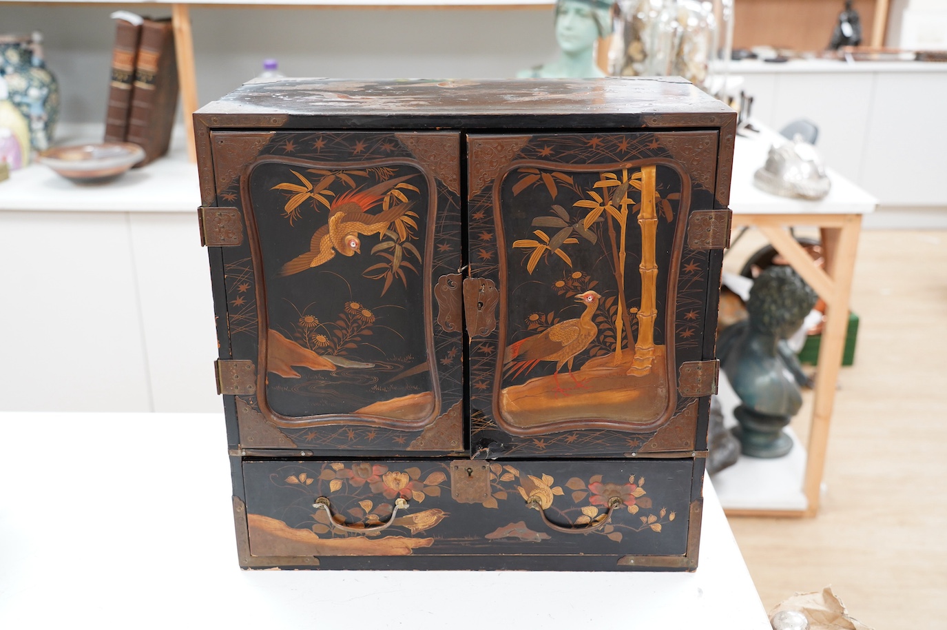 A 19th century Japanese lacquered table cabinet, 46cm. Condition - poor